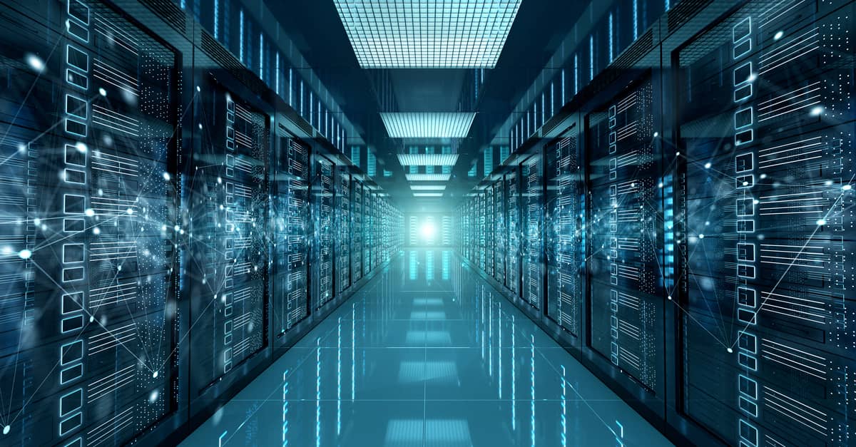 A corridor filled with multiple server racks, illustrating a high-tech data storage facility.