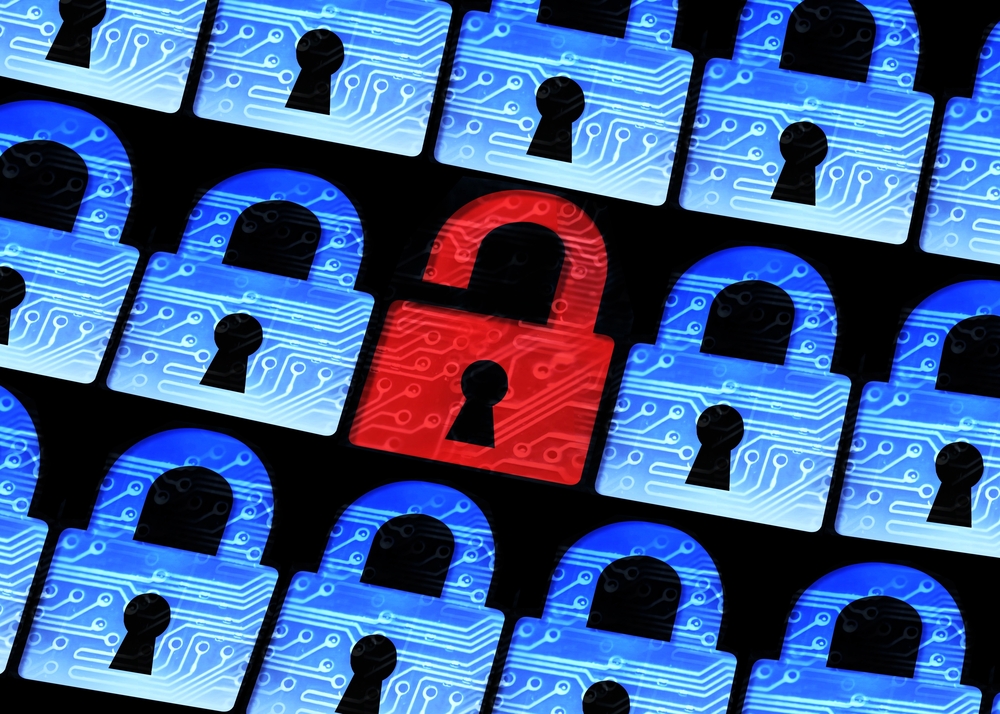 A red unlocked padlock among blue and white locked padlocks, symbolizing vulnerability amidst security.