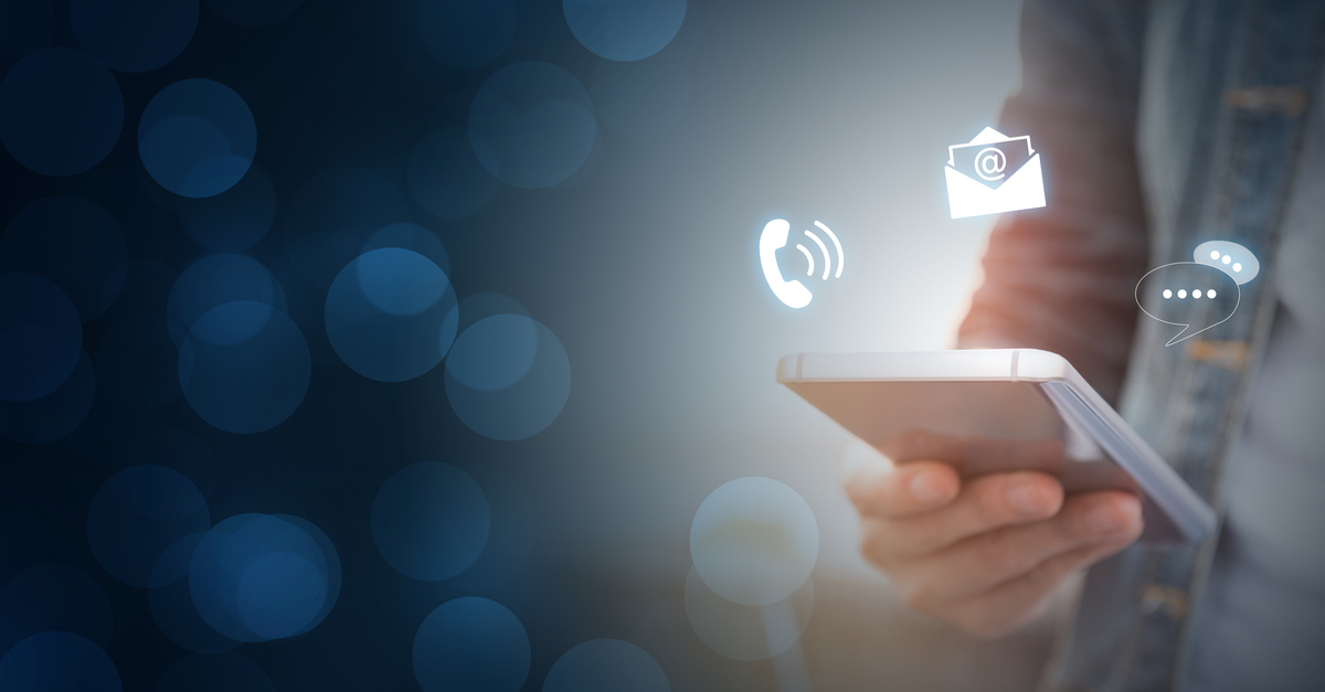 Individual engaging with a phone to connect through various communication platforms.