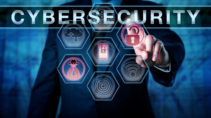 An individual interacting with cybersecurity icons, representing the safeguarding of information from unauthorized access and threats.