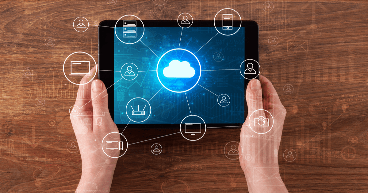 Person holding a tablet displaying a cloud icon, symbolizing the selection of cloud computing solutions for businesses.
