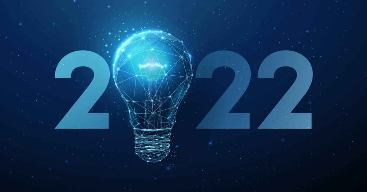 A graphic celebrating the year 2022, featuring a bright light bulb illustration and bold text.
