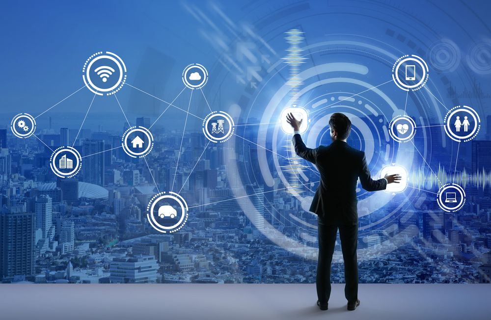 Businessman standing in front of a city skyline, surrounded by various business-related icons.